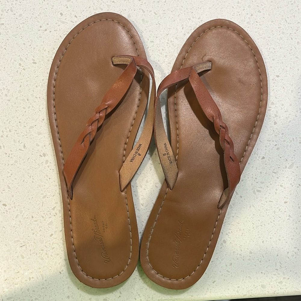 Brown braided sandals